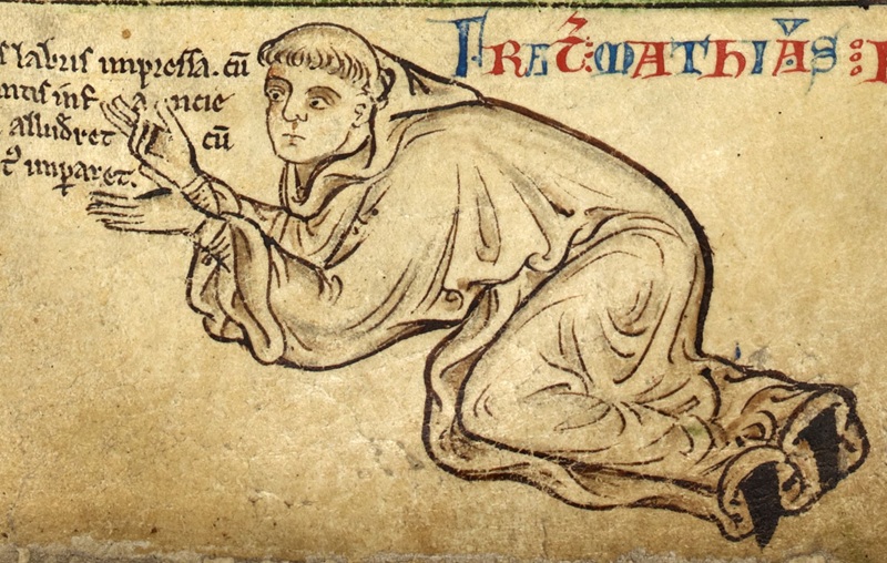 Detail eines Selbstporträts von Matthäus Paris mit seinem Namen „Frater Mathias Parisiensis», aus dem Vorwort zu Matthäus Paris' Historia Anglorum, St. Albans, um 1250-1259, Royal MS 14 C VII, f. 6r, London British Library. Foto: Wikipedia. 